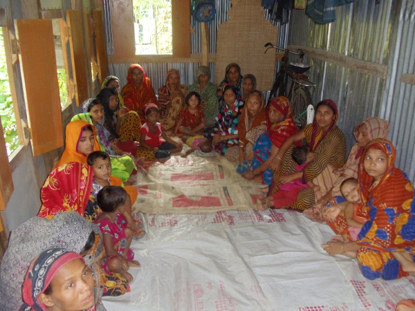 Women multi-tasking: kid care and attending training