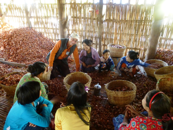 Howard Prussic with onion farmers in Myanmar