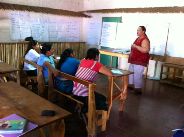 Volunteer Quanah Stamps trains a group of women farmers in El Salvador