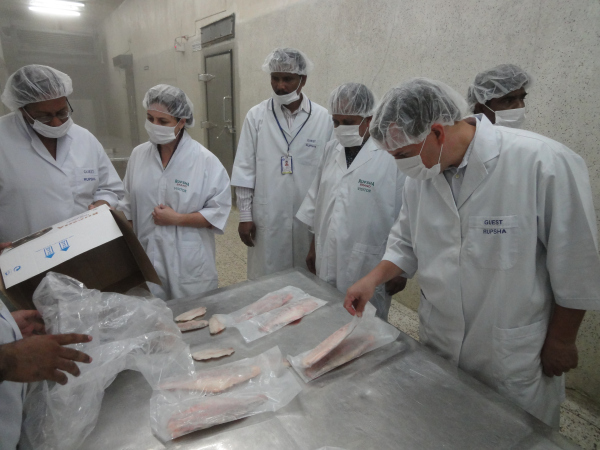 Inspecting fish processing activities at Rupsha Fish & Alllied Industries